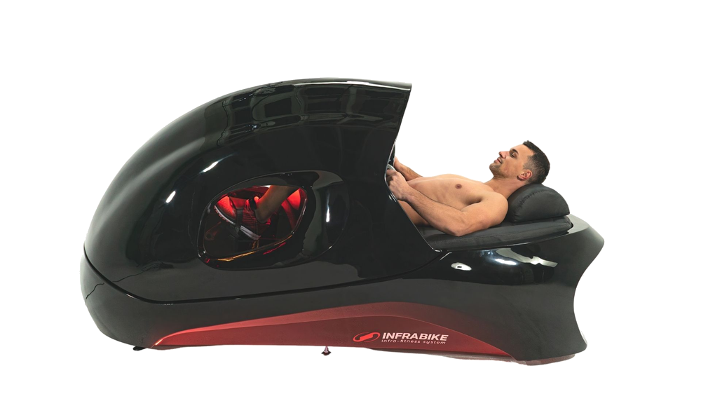 Woman using INFRABIKE® infrared exercise bike — burn 1300 calories in 30 minutes